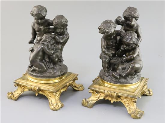 After Paul Emile Machault (1800-1866). A pair of 19th century bronze groups of putti playing dice and weeping, height 10in.